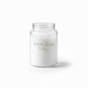 White powdered citric acid in a glass container