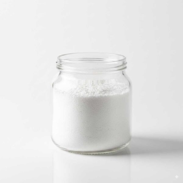 White sodium carbonate powder (baking soda) in a glass container on a white background