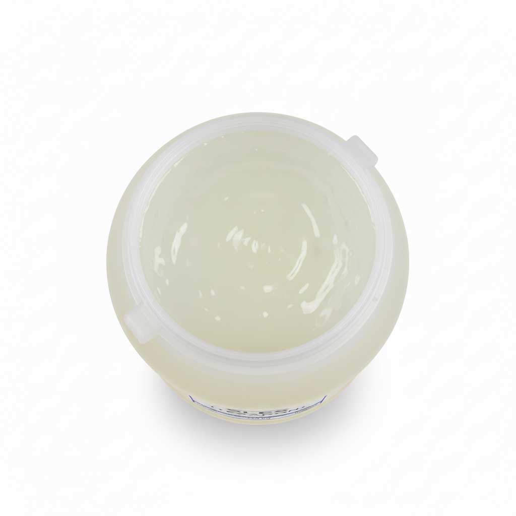 Top view of a barrel containing liquid texapone (SLES), showing the texture and transparent color of the liquid, white background with soft shadows