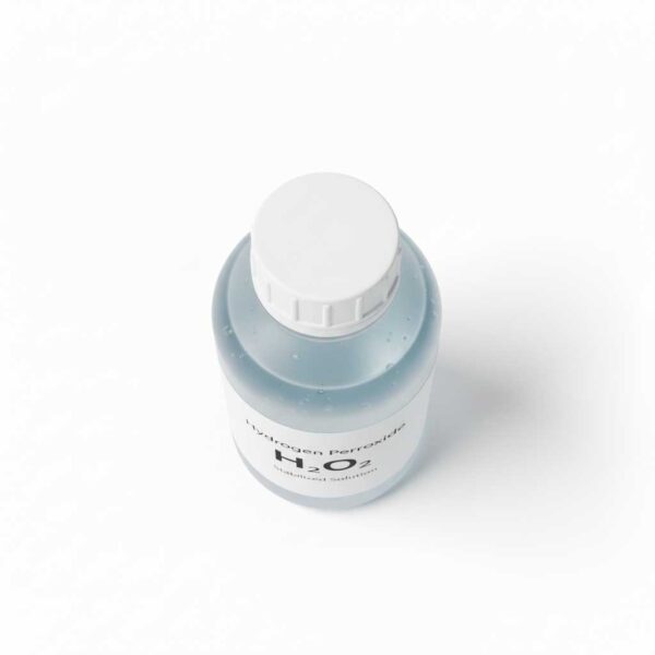 Top view of hydrogen peroxide bottle showing Hydrogen Peroxide H₂O₂ label