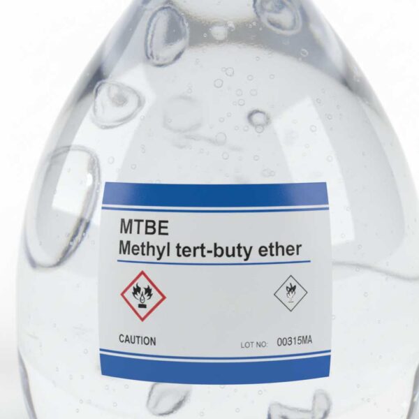Close-up of MTBE liquid surface and label details