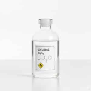 Colorless liquid xylene in a glass laboratory bottle